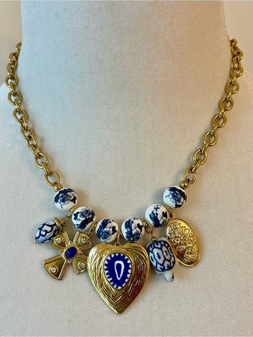 Gold Tone Steel Heart Charm Necklace with Blue White Floral Ceramic Beads